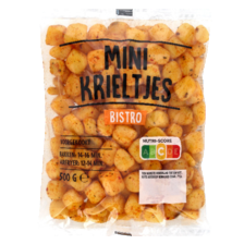 Opbakaardappelen ui en paprika, minikrieltjes bistro of aardappelpartjes met schil